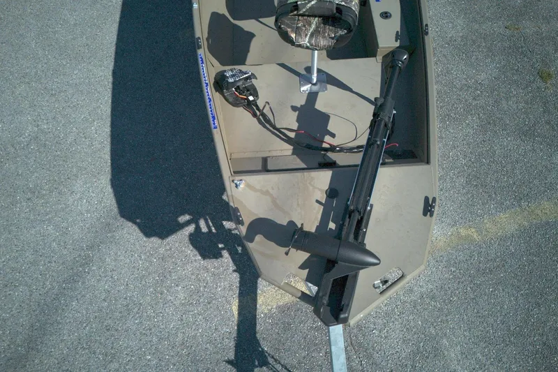 Slide: The Image of Top view of a 2025 G3 15DK boat on a trailer, featuring a trolling motor. - 4