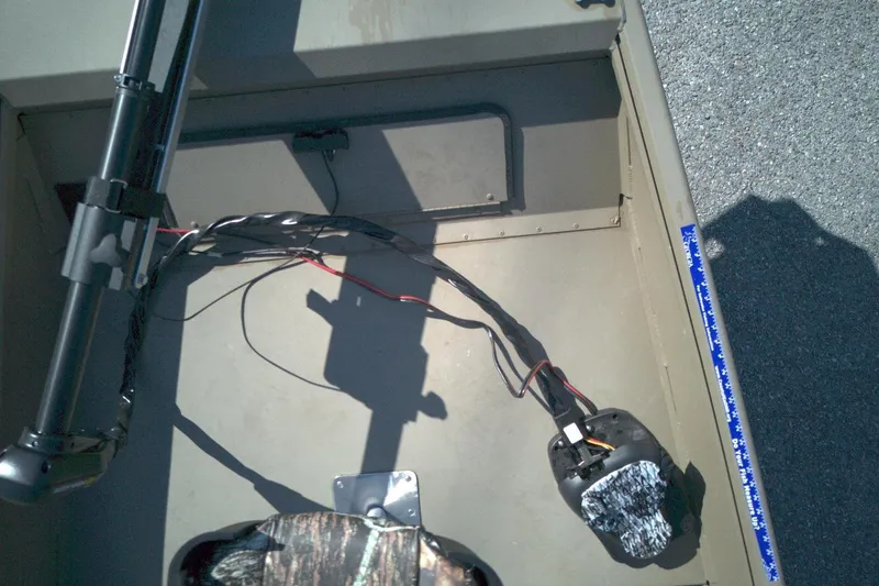 Slide: The Image of Interior of a 2025 G3 15DK boat showing wiring and equipment setup. - 7