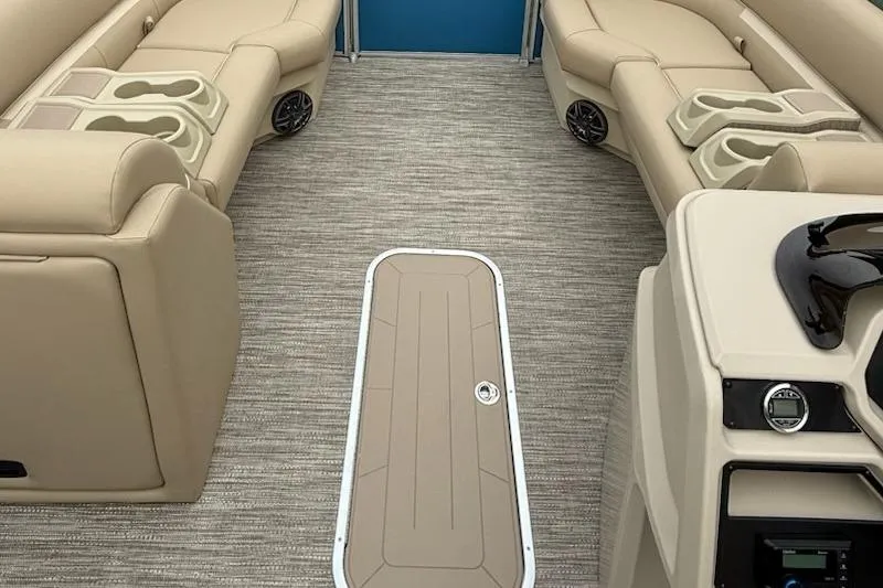 Slide: The Image of Interior of 2026 Godfrey Xperience EX2286SBX pontoon boat with beige seating and carpet. - 5