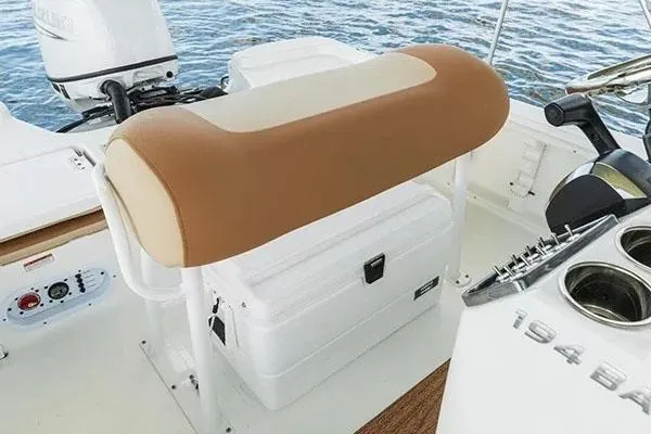 Slide: The Image of Manufacturer Provided Image: 2024 NauticStar 194 Bay boat interior with tan seat and storage. - 8