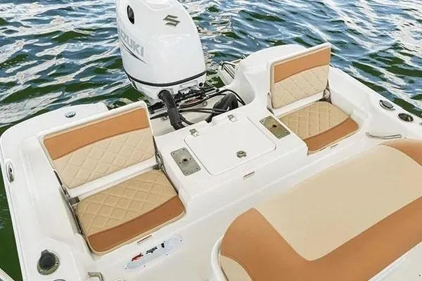 Slide: The Image of Manufacturer Provided Image: 2024 NauticStar 194 Bay boat with Suzuki outboard motor and tan seating. - 9