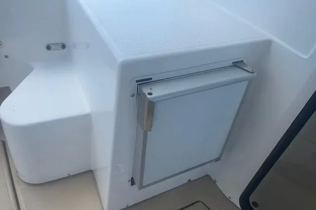 Slide: The Image of 2019 Ranger Tugs R-31-S boat interior detail with storage compartment. - 10