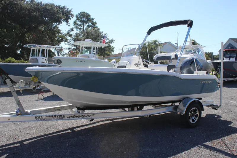 The Image of 2026 Tidewater 180 CC Adventure boat on trailer, parked outdoors. - 2