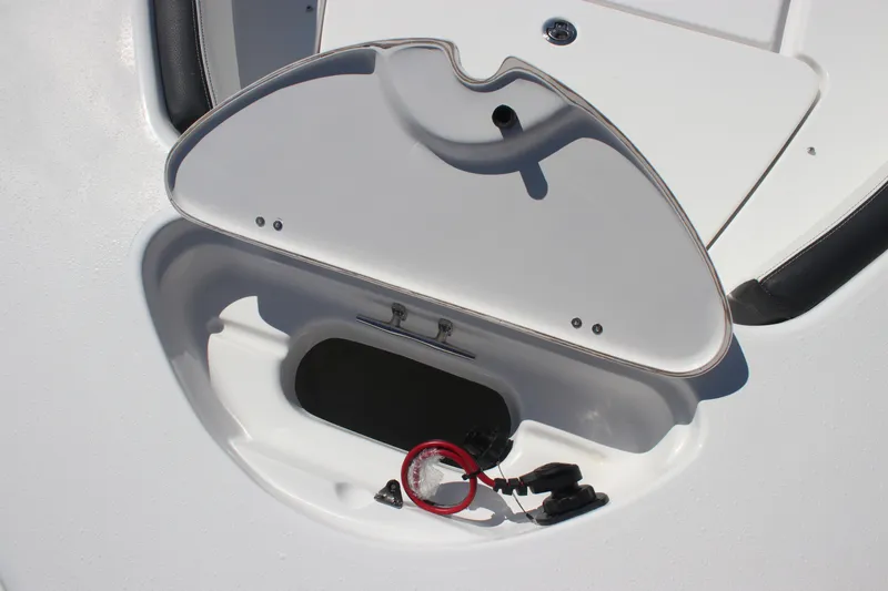 Slide: The Image of Open storage compartment on 2026 Tidewater 180 CC Adventure boat. - 4