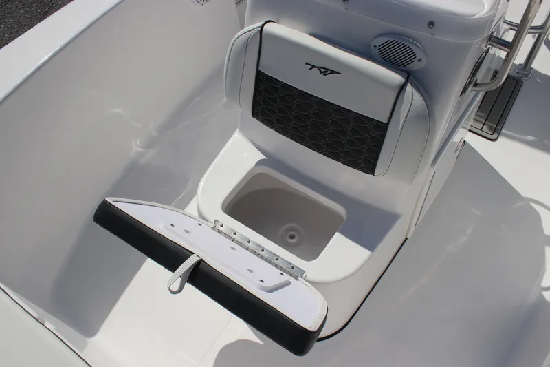 Slide: The Image of 2026 Tidewater 180 CC Adventure boat interior with seating and storage compartment. - 9