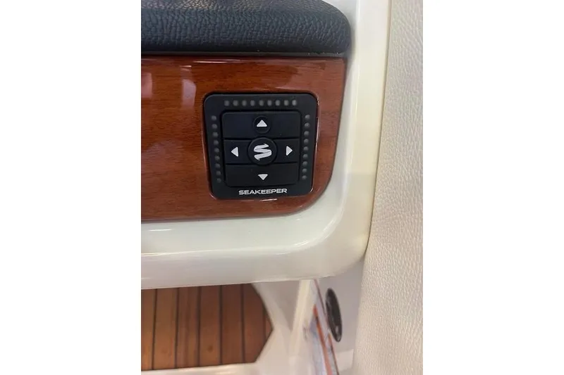 Slide: The Image of Control panel on 2024 Chris-Craft Launch 27 boat with Seakeeper stabilization system. - 17