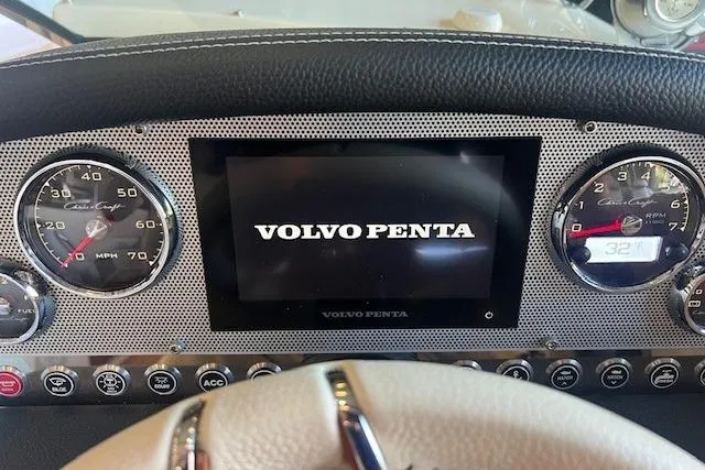 Slide: The Image of Dashboard of 2024 Chris-Craft Launch 27 with Volvo Penta display and gauges. - 19