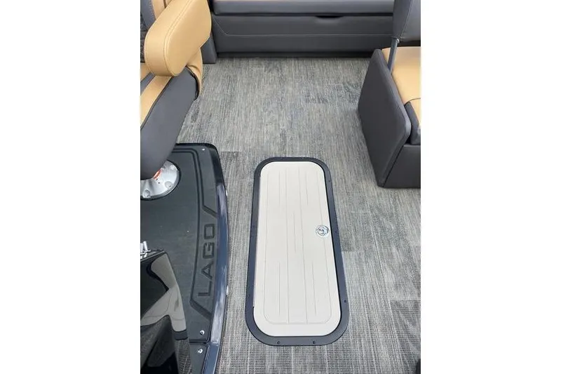 Slide: The Image of 2025 Viaggio Lago Z-S interior with gray flooring and tan seating. - 12