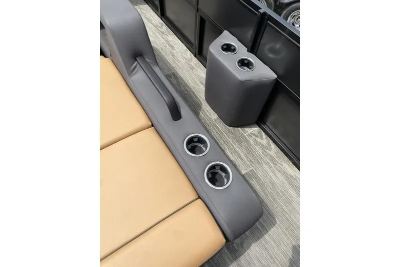 Slide: The Image of 2025 Viaggio Lago Z-S interior with tan seating and multiple cup holders. - 16