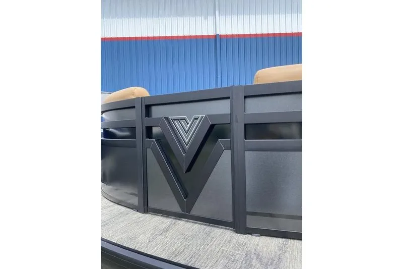 Slide: The Image of 2025 Viaggio Lago Z-S boat with sleek black design and logo detail. - 4