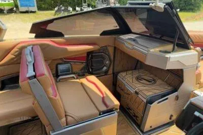 Slide: The Image of 2024 Tigé Ultré 25ZX interior with luxurious seating and modern dashboard design. - 8