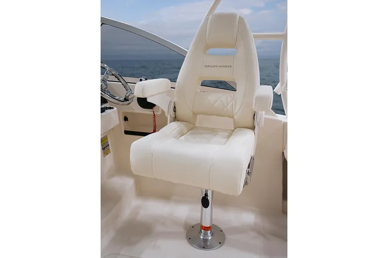 Slide: The Image of 2023 Grady-White Freedom 235 boat interior with open storage compartment. - 11