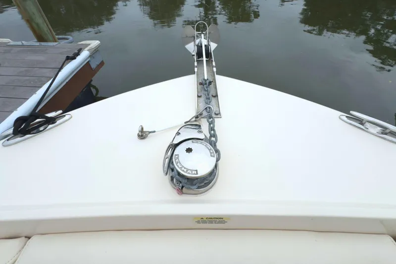 Slide: The Image of Bow of 2023 Grady-White Freedom 235 boat with anchor and winch system. - 30