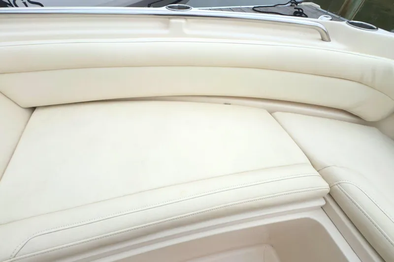 Slide: The Image of 2023 Grady-White Freedom 235 boat interior with cream-colored seating. - 31