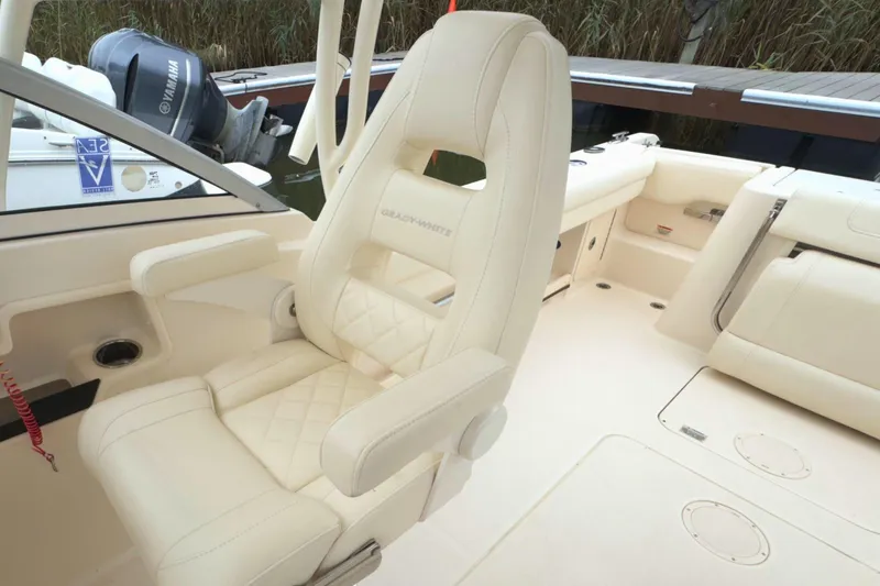 Slide: The Image of 2023 Grady-White Freedom 235 boat interior with luxurious seating and Yamaha engine. - 37