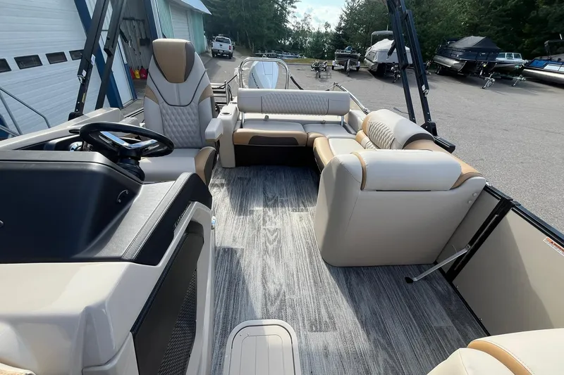Slide: The Image of 2026 Avalon Catalina Versatile Rear Bench boat interior with luxurious seating and modern design. - 12