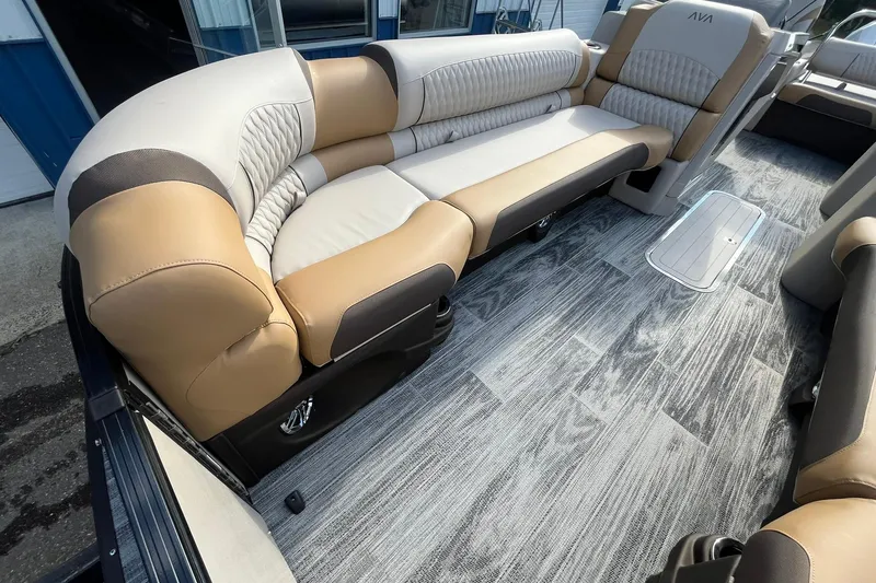 Slide: The Image of Luxurious seating on 2026 Avalon Catalina Versatile Rear Bench boat, featuring elegant upholstery and flooring. - 9