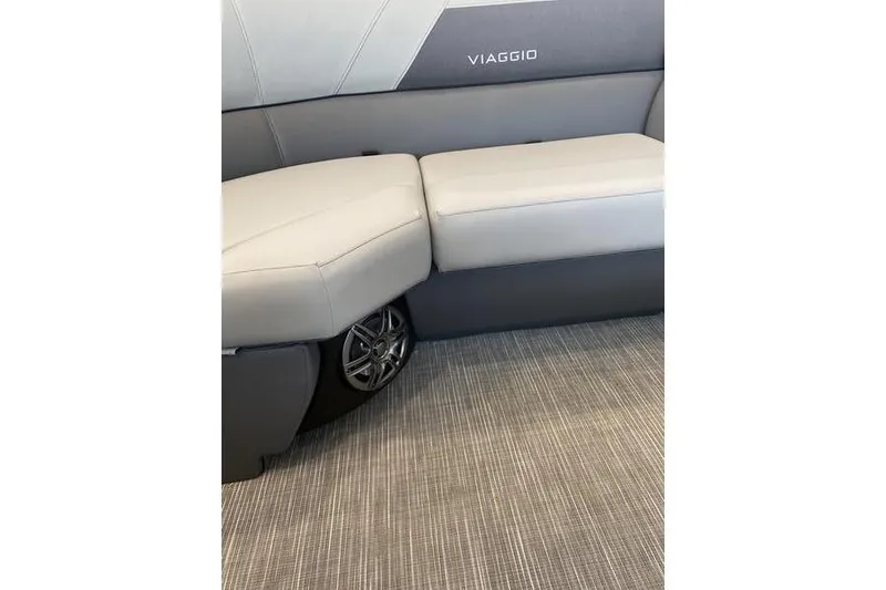Slide: The Image of 2025 Viaggio Lago V-U boat interior with gray seating and integrated speaker. - 10