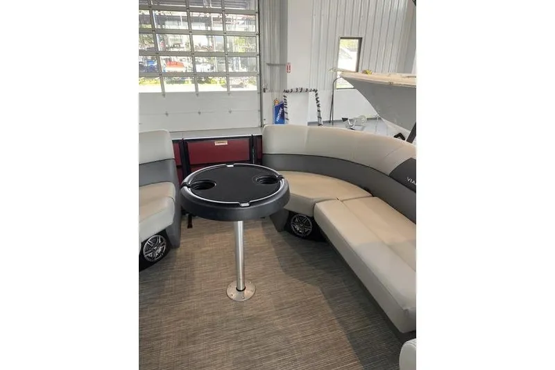 Slide: The Image of Interior of 2025 Viaggio Lago V-U boat with curved seating and table. - 18