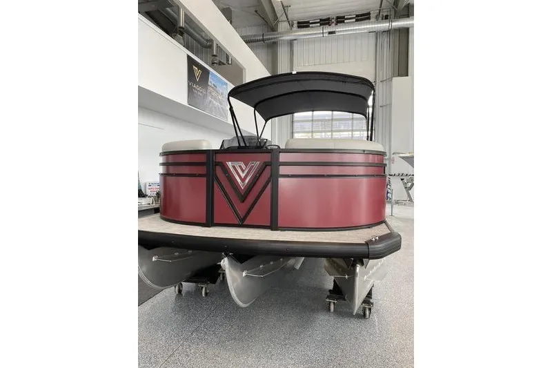Slide: The Image of 2025 Viaggio Lago V-U pontoon boat in showroom, featuring sleek design and modern aesthetics. - 3