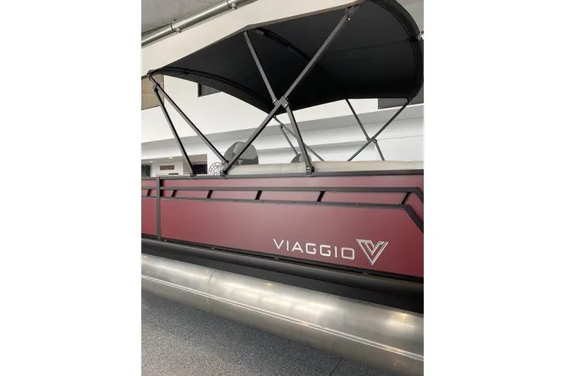 Slide: The Image of 2025 Viaggio Lago V-U pontoon boat with sleek design and canopy. - 4