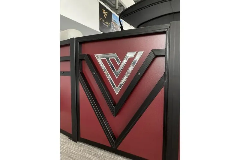 Slide: The Image of Red and black Viaggio Lago V-U 2025 logo on display panel. - 5