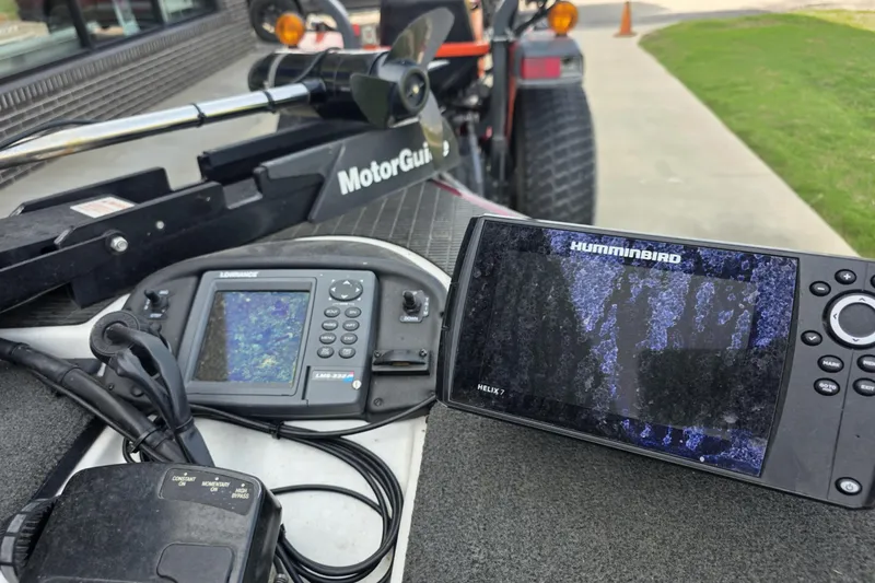 Slide: The Image of 2006 Triton Tr-21X HP DC boat with Humminbird and Lowrance fish finders. - 3