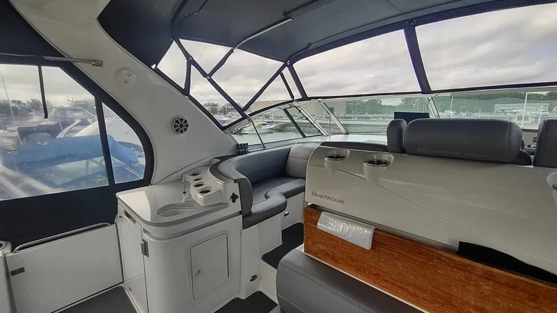 Slide: The Image of Interior of 2001 Cruisers Yachts 4450 Express Motoryacht with seating and windows. - 10