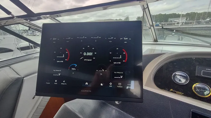 Slide: The Image of Garmin display on 2001 Cruisers Yachts 4450 Express Motoryacht dashboard, showing navigation data. - 15