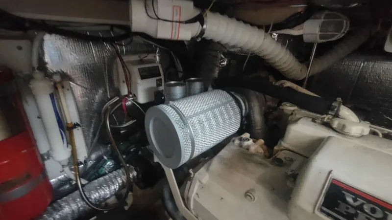 Slide: The Image of Engine room of 2001 Cruisers Yachts 4450 Express Motoryacht with Volvo Penta components. - 48