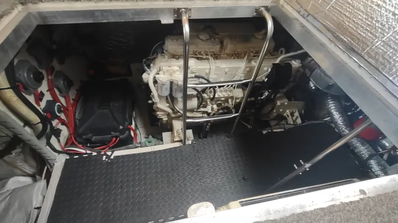 Slide: The Image of Engine room of 2001 Cruisers Yachts 4450 Express Motoryacht with visible machinery and components. - 47