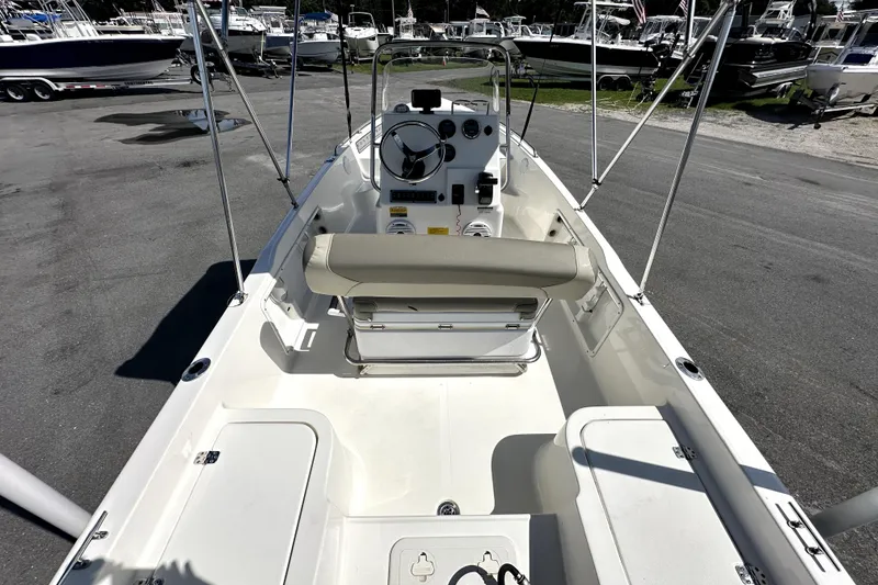 Slide: The Image of 2022 Key West 1720 Center Console boat interior with steering wheel and seating. - 14
