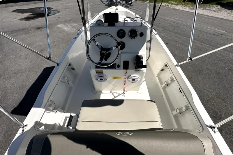 Slide: The Image of 2022 Key West 1720 Center Console boat interior with steering wheel and controls. - 17