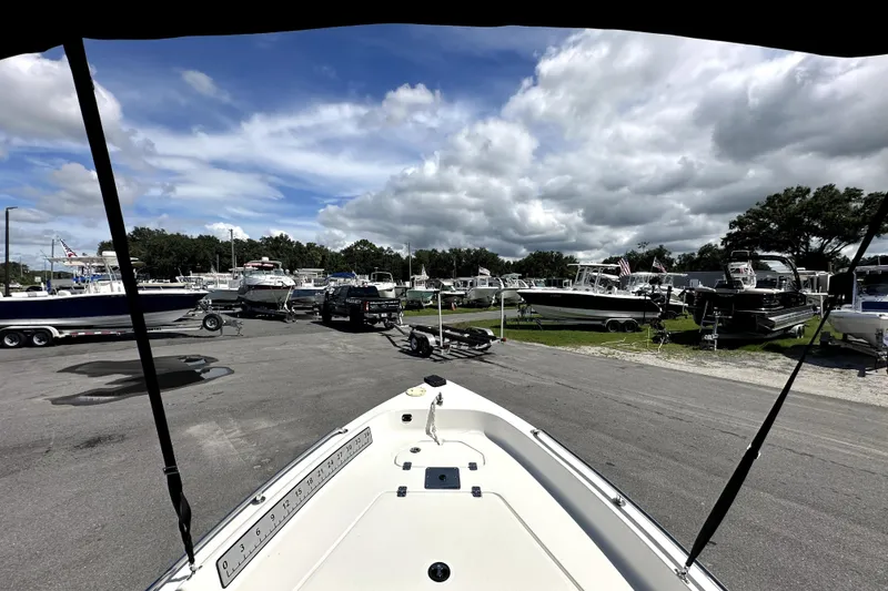 Slide: The Image of 2022 Key West 1720 Center Console boat at a marina with cloudy sky. - 20