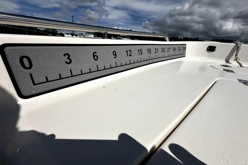 Slide: The Image of 2022 Key West 1720 Center Console boat with built-in measuring ruler on deck. - 25