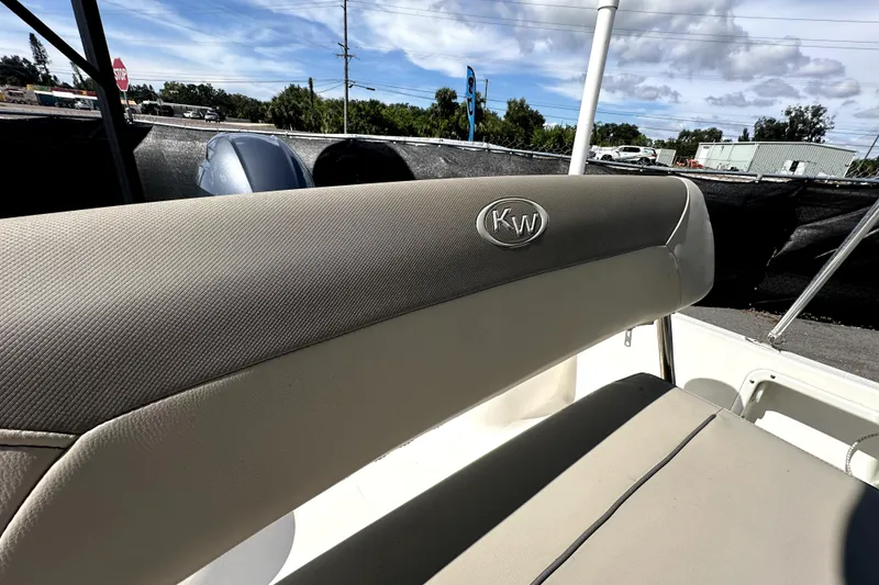 Slide: The Image of 2022 Key West 1720 Center Console boat interior with KW logo on seat. - 41