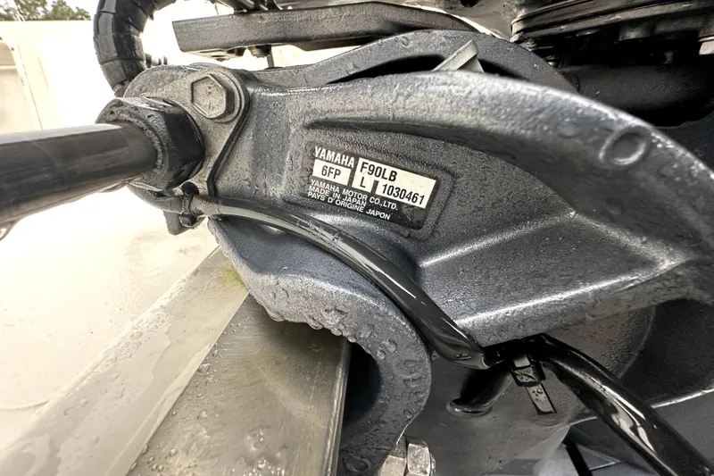 Slide: The Image of Close-up of Yamaha F90LB engine part on 2022 Key West 1720 Center Console boat. - 48