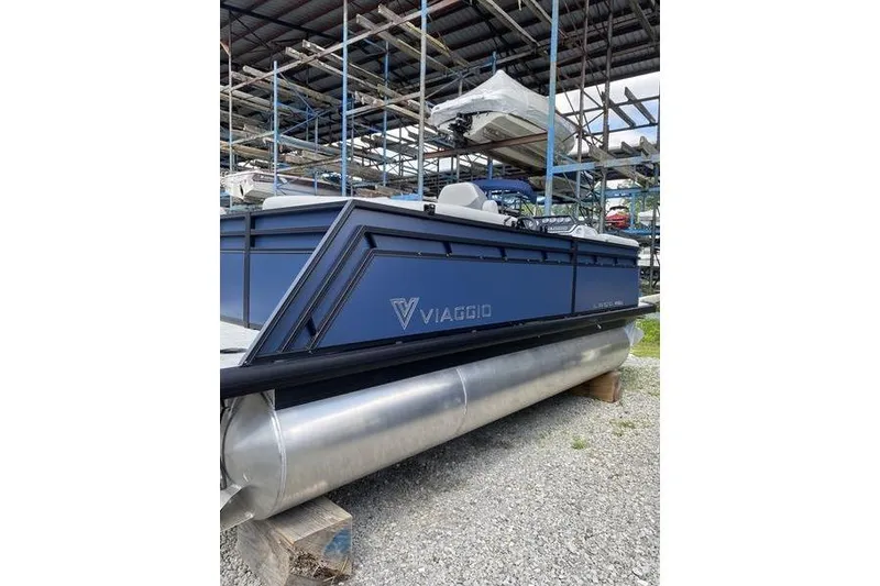 The Image of 2025 Viaggio Lago V-U pontoon boat in storage facility. - 0