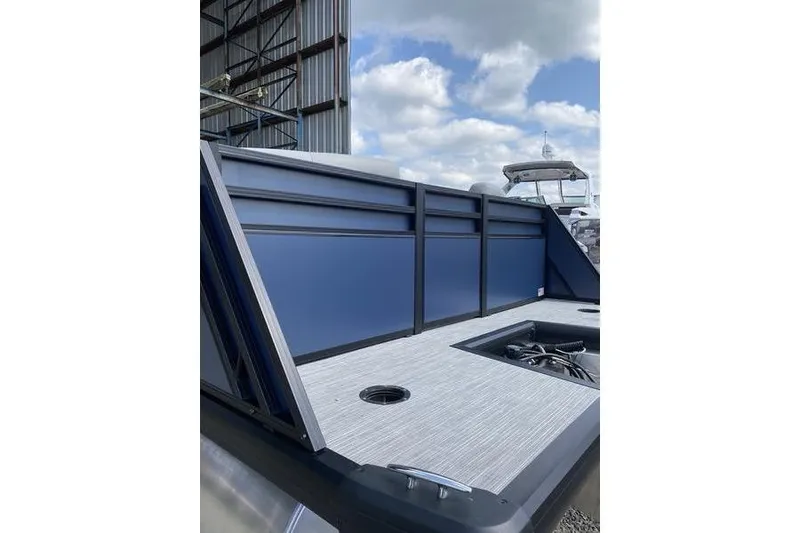 Slide: The Image of 2025 Viaggio Lago V-U boat deck with modern design and blue paneling. - 4