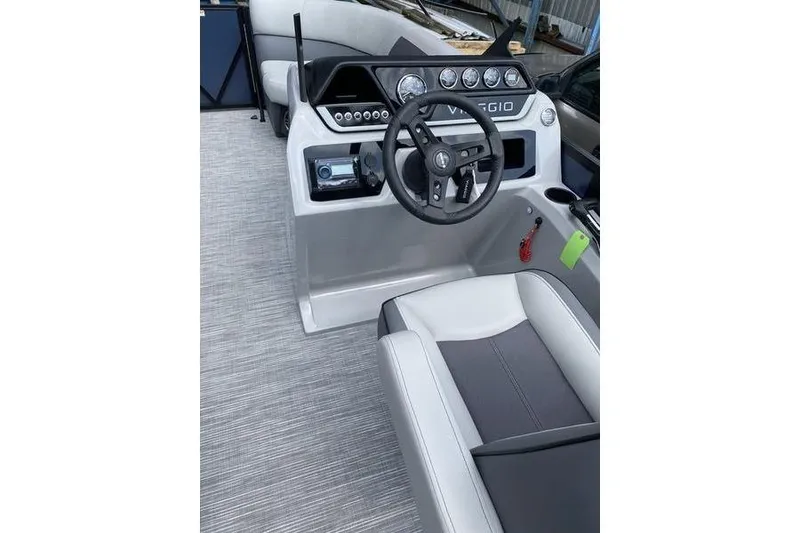 Slide: The Image of 2025 Viaggio Lago V-U boat interior with modern steering console and seating. - 9