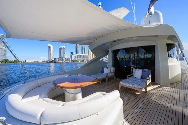Slide: The Image of Luxurious 2005 McMullen & Wing Custom Express Sport Cruiser yacht deck with city skyline view. - 1
