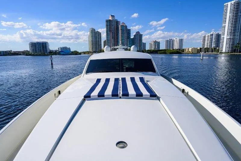Slide: The Image of 2005 McMullen & Wing Custom Express Sport Cruiser on water with city skyline. - 14