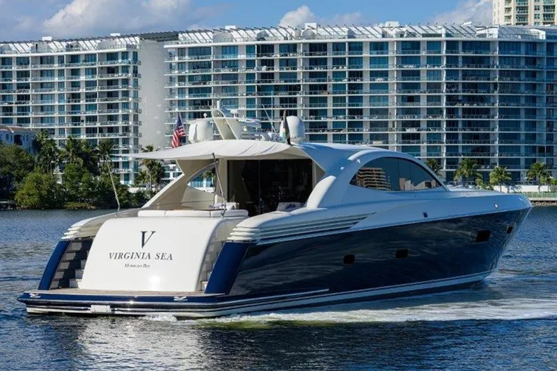 Slide: The Image of 2005 McMullen & Wing Custom Express Sport Cruiser on water, cityscape background. - 16