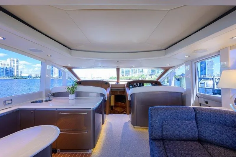 Slide: The Image of Luxurious interior of 2005 McMullen & Wing Custom Express Sport Cruiser with waterfront view. - 3