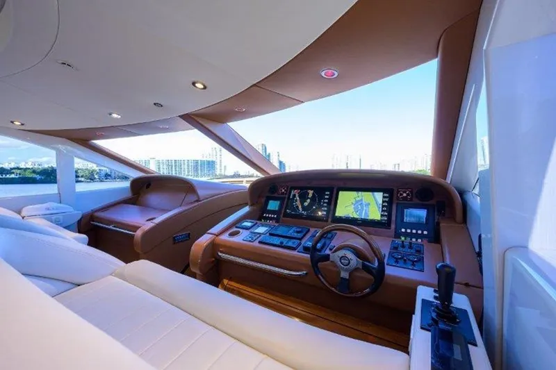 Slide: The Image of Luxurious 2005 McMullen & Wing Custom Express Sport Cruiser cockpit with advanced navigation systems. - 6