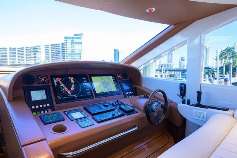 Slide: The Image of Luxurious 2005 McMullen & Wing Custom Express Sport Cruiser helm with advanced navigation systems. - 7