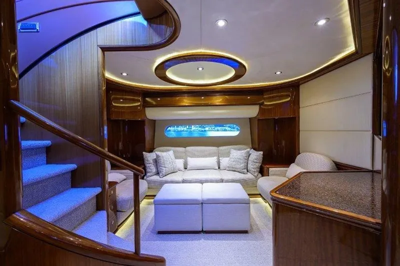 Slide: The Image of Luxurious interior of 2005 McMullen & Wing Custom Express Sport Cruiser with elegant seating and ambient lighting. - 9