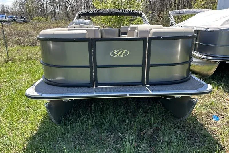 Slide: The Image of 2024 Bentley Pontoons LE 200 CW on grassy field, rear view. - 5