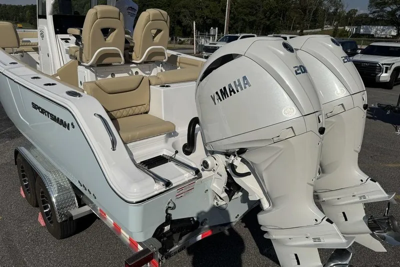 Slide: The Image of 2026 Sportsman Heritage 261 Center Console with dual Yamaha outboard engines. - 17