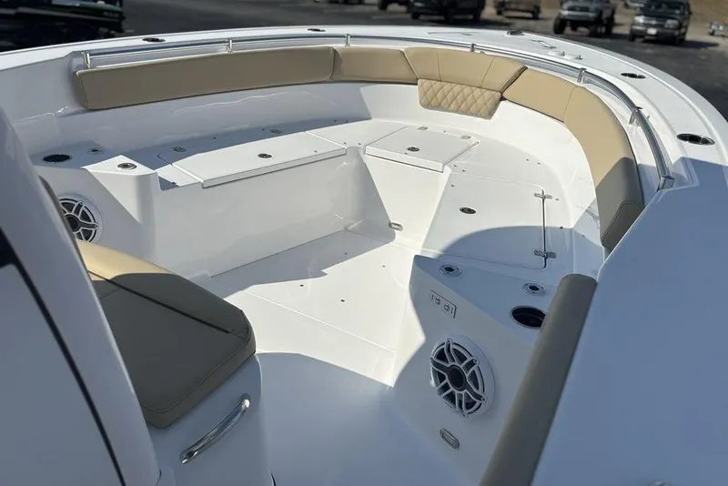 Slide: The Image of 2026 Sportsman Heritage 261 Center Console boat with spacious seating and modern design. - 24